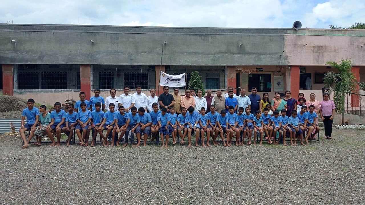 Students with staff outside the school