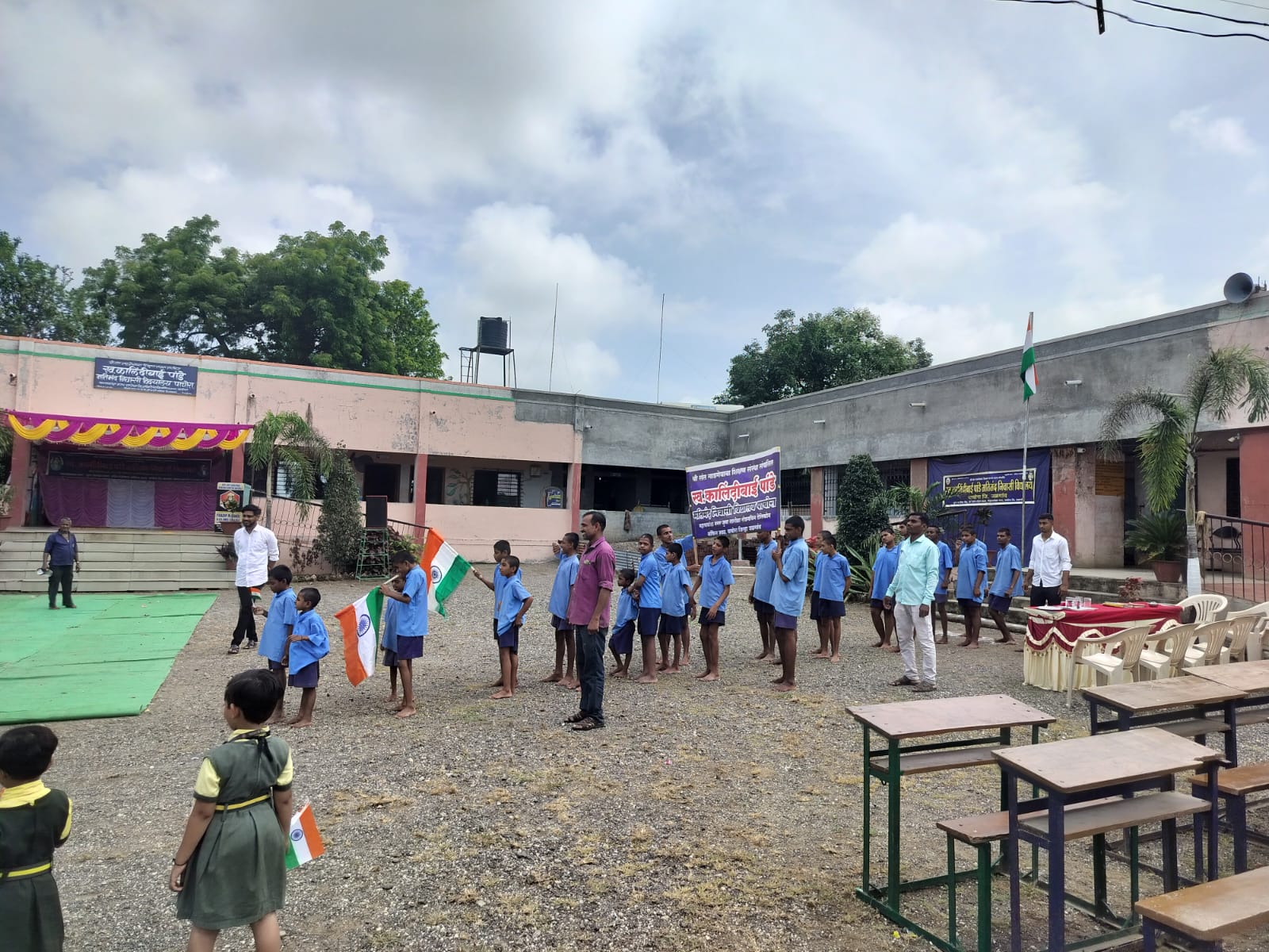 Flag hoisting at school assembly